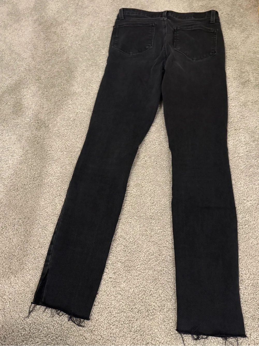 PAIGE Washed Black High-Rise Skinny Jeans with Raw Hem